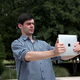 Image for article titled Man Taking Photo With iPad Oblivious To How Badass He Looks